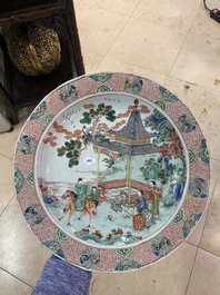 A Chinese famille verte dish with figures in a landscape, Kangxi